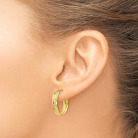 Load image into Gallery viewer, 10K Polished and D/C Oval Hinged Hoop Earrings
