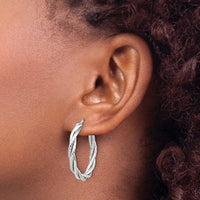 Load image into Gallery viewer, 10K White Gold Polished Twisted Hoop Earrings
