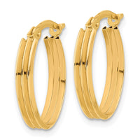 Load image into Gallery viewer, 10K Polished and Grooved Oval Hoop Earrings
