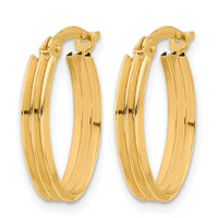 Load image into Gallery viewer, 10K Polished and Grooved Oval Hoop Earrings
