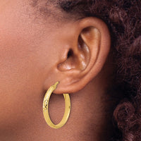 Load image into Gallery viewer, 10K Polished and Diamond-cut Round Hoop Earrings

