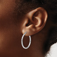Load image into Gallery viewer, 10k White Gold Diamond-cut 2mm Round Tube Hoop Earrings
