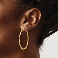 Load image into Gallery viewer, 10k Diamond-cut 2mm Round Tube Hoop Earrings
