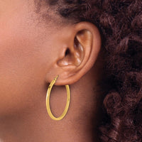 Load image into Gallery viewer, 10k 2mm Square Tube Hoop Earrings
