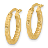 Load image into Gallery viewer, 10K Polished and Textured Oval Hoop Earrings
