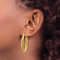 Load image into Gallery viewer, 10k Polished and Textured Triple Oval Twist Hoop Earrings
