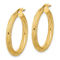 Load image into Gallery viewer, 10k Polished and Textured Twisted Tube Hoop Earrings
