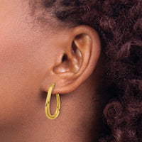 Load image into Gallery viewer, 10K Polished Twist Teardrop Hoop Earrings

