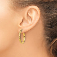 Load image into Gallery viewer, 10k D/C 2.8x25mm Hollow Hoop Earrings
