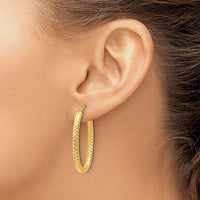 Load image into Gallery viewer, 10K ForeverLite Polished and Textured Oval Hoop Earrings
