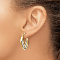 Load image into Gallery viewer, 10K w/ White Rhodium Polished Oval Hoop Earrings
