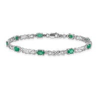 Load image into Gallery viewer, 14k White Gold Complete Diamond and Oval Emerald X-design 7.25 inch Bracelet
