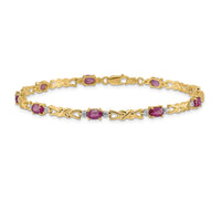 Load image into Gallery viewer, 14k Complete Diamond and Oval Ruby X-design 7.25 inch Bracelet
