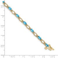 Load image into Gallery viewer, 14k Complete Diamond and Oval Swiss Blue Topaz Heart Accent 7 inch Bracelet
