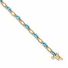 14k Complete Diamond and Oval Swiss Blue Topaz Heart Accent 7 inch Bracelet