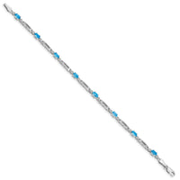 Load image into Gallery viewer, 10k White Gold Diamond and Blue Topaz Bracelet
