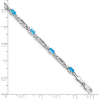Load image into Gallery viewer, 10k White Gold Diamond and Blue Topaz Bracelet
