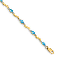 Load image into Gallery viewer, 10k Fancy Diamond and Blue Topaz Bracelet
