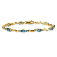 Load image into Gallery viewer, 14k Complete Diamond and Oval Swiss Blue Topaz Wavy Link 7 inch Bracelet
