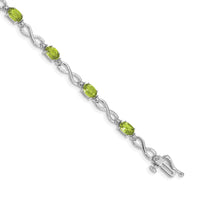 Load image into Gallery viewer, 10k White Gold Peridot and Diamond Infinity Bracelet
