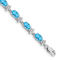 Load image into Gallery viewer, 14k White Gold Complete Diamond and Oval Swiss Blue Topaz Floral 7 inch Bracelet
