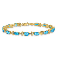 Load image into Gallery viewer, 14k Complete Diamond and Oval Swiss Blue Topaz Floral 7 inch Bracelet
