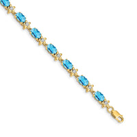 Load image into Gallery viewer, 14k Complete Diamond and Oval Swiss Blue Topaz Floral 7 inch Bracelet
