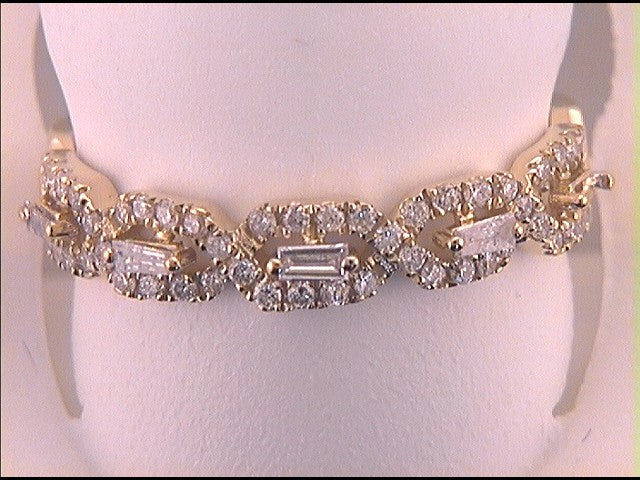 14kt Yellow Gold Womens Baguette Diamond Modern Twist Stackable Band Ring 1/3 Cttw