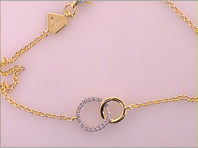 1/12CTW-DIA BRACELET--LARGE INTERLOCKING CIRCLES
