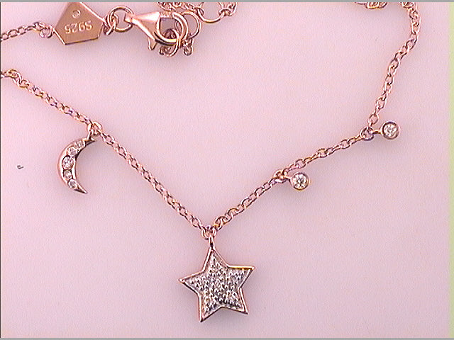 1/10CTW-STAR AND MOON DIA BRACELET