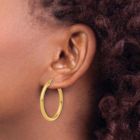 Load image into Gallery viewer, 14k Polished 2.5mm Lightweight Tube Hoop Earrings
