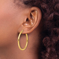 Load image into Gallery viewer, 14k Polished 2.5mm Lightweight Tube Hoop Earrings
