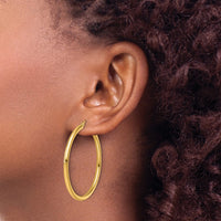 Load image into Gallery viewer, 14k Polished 2.5mm Lightweight Tube Hoop Earrings
