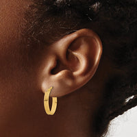 Load image into Gallery viewer, 14K Polished and Grooved Oval Hoop Earrings

