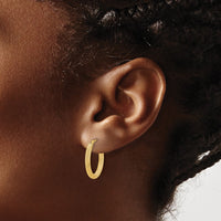 Load image into Gallery viewer, 14K Polished and Textured Oval Hoop Earrings
