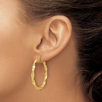 Load image into Gallery viewer, 14K Polished and Brushed Twisted Hoop Earrings
