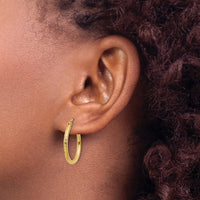 Load image into Gallery viewer, 14k Diamond-cut 2mm Round Tube Hoop Earrings
