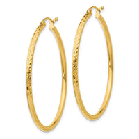 Load image into Gallery viewer, 14k Diamond-cut 2mm Round Tube Hoop Earrings
