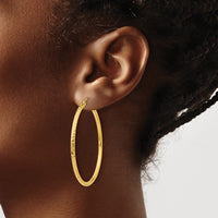 Load image into Gallery viewer, 14k Diamond-cut 2mm Round Tube Hoop Earrings
