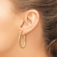 Load image into Gallery viewer, 14k Knife Edge D/C Hollow 2.5x35mm Hoop Earrings
