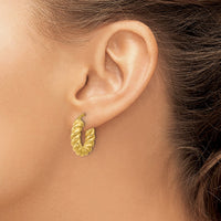 Load image into Gallery viewer, 14K Polished and Twisted Round Hoop Earrings
