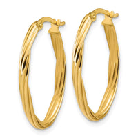 Load image into Gallery viewer, 14K Polished and Grooved Twist Oval Hoop Earrings
