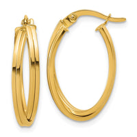 Load image into Gallery viewer, 14K Polished and Grooved Oval Twist Hoop Earrings
