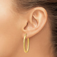 Load image into Gallery viewer, 14K ForeverLite Polished and Textured Oval Hoop Earrings

