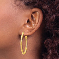 Load image into Gallery viewer, 14K ForeverLite Polished and Textured Oval Hoop Earrings
