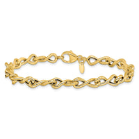 Load image into Gallery viewer, 14K Polished/Textured Twisted Infinity Link Bracelet
