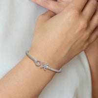 Load image into Gallery viewer, Sterling Silver Rhod-plat Polished CZ X &amp; O Woven Flexible Cuff
