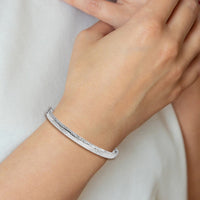 Load image into Gallery viewer, Sterling Silver RH-plated Polished &amp; Textured Bangle
