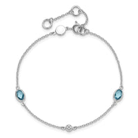 Load image into Gallery viewer, White Ice Sterling Silver Rhodium-plated 7.5 inch Diamond and Blue Topaz Bracelet with 1.25  inch Extender
