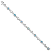 Load image into Gallery viewer, Sterling Silver Rhodium-plated Dia. &amp; Lt Swiss Blue Topaz Oval Bracelet

